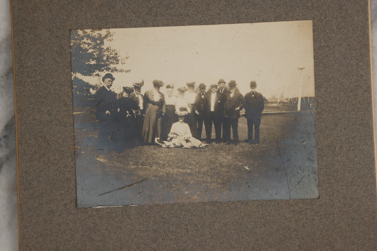 Lot 128 - Grouping Of Five Antique Outdoor Boarded Photographs, Victorian Era, Including Woman Fishing July 1896; Three Women Seated On Rocky Shore; Large Group With Dog June 1896; Ladies Posed On Porch Of “Chase Cabin”; And Group With Dog
