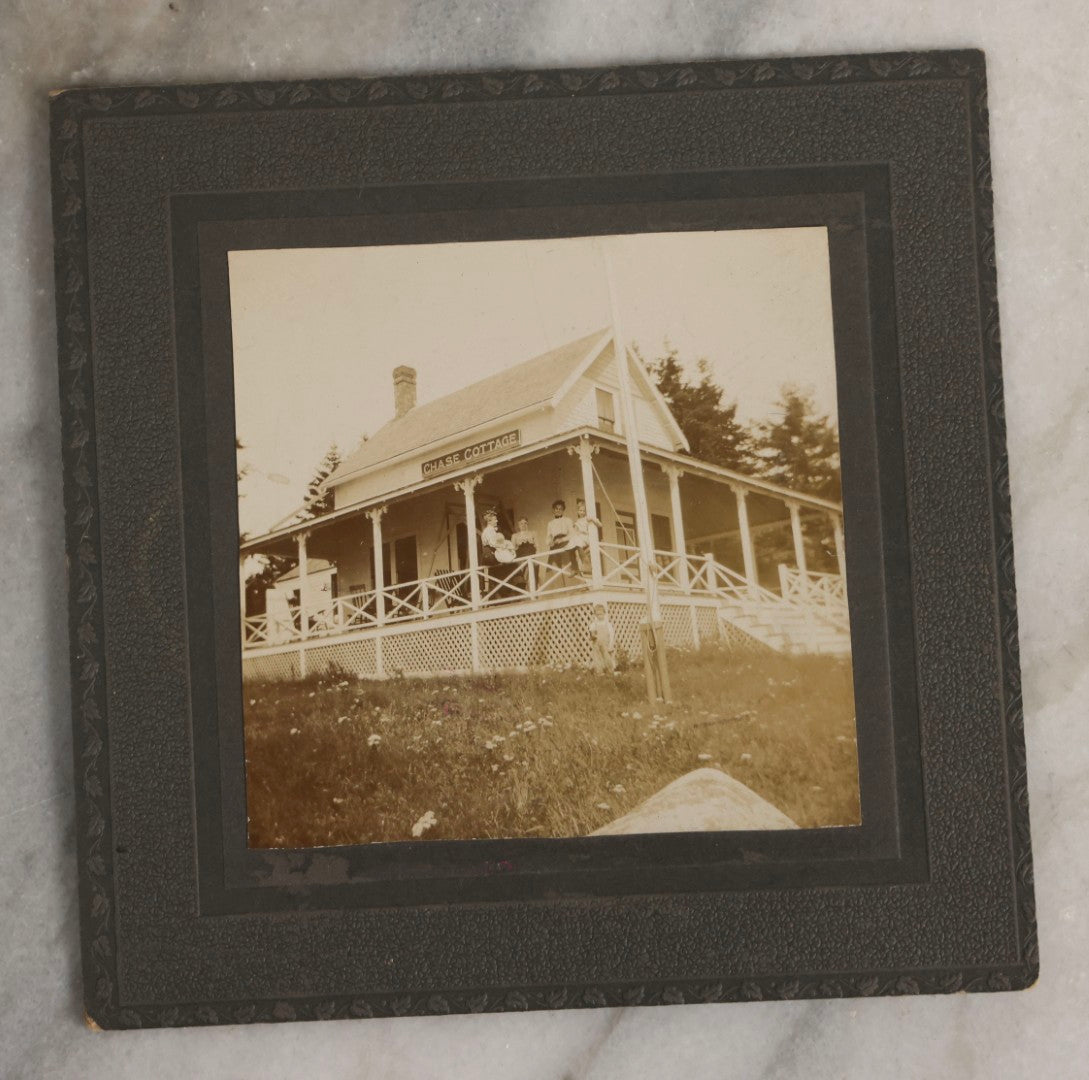 Lot 128 - Grouping Of Five Antique Outdoor Boarded Photographs, Victorian Era, Including Woman Fishing July 1896; Three Women Seated On Rocky Shore; Large Group With Dog June 1896; Ladies Posed On Porch Of “Chase Cabin”; And Group With Dog