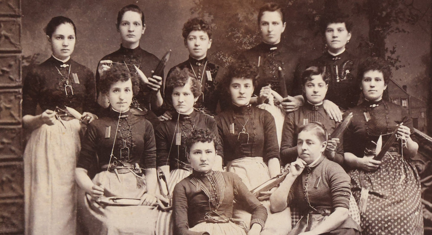 Lot 133 - Antique Cabinet Card Photograph Of Twelve Women Posed With Sewing Tools And Apparatus, Including Thread, Bobbins, And Scissors, Photographed By O. Desmarais, 999 Elm Street, Manchester, New Hampshire