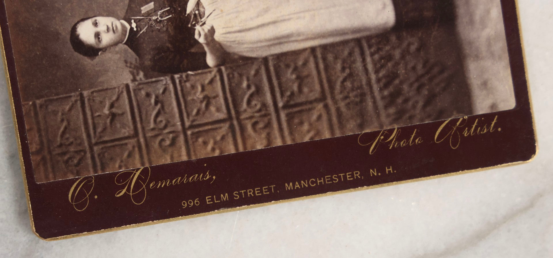 Lot 133 - Antique Cabinet Card Photograph Of Twelve Women Posed With Sewing Tools And Apparatus, Including Thread, Bobbins, And Scissors, Photographed By O. Desmarais, 999 Elm Street, Manchester, New Hampshire
