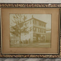 Lot 135 - Antique Framed Photograph Of Multi‑Story Wooden Storefront With Signage Alexstrom Skräddare ("Tailor"), Annotated On Reverse As Bystrom Family's “First Home In America – Greenwood St. Next To Lutheran Church” Dated 1896, 13-3/4" x 11-3/8"
