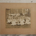 Lot 137 - Antique Boarded Photograph Of Large Group Of Children In Woodland Clearing With Adults Standing Behind, Likely Summer Camp, Photographed By Moon Co. Photo, Worcester, Massachusetts, June 28, 1910