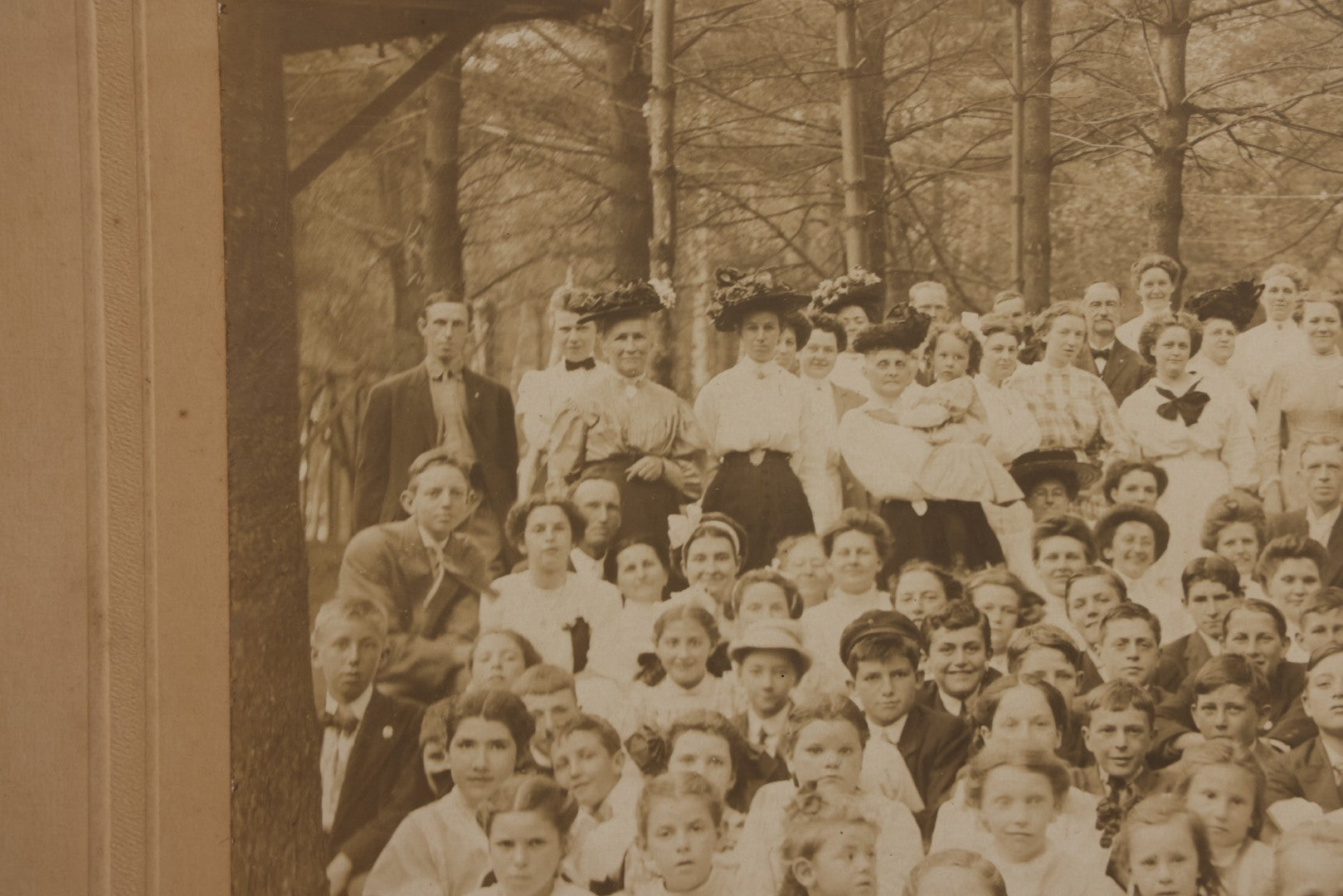Lot 137 - Antique Boarded Photograph Of Large Group Of Children In Woodland Clearing With Adults Standing Behind, Likely Summer Camp, Photographed By Moon Co. Photo, Worcester, Massachusetts, June 28, 1910