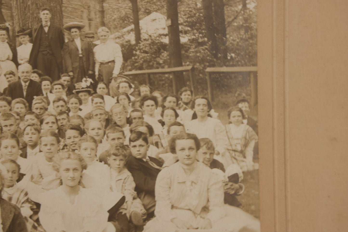 Lot 137 - Antique Boarded Photograph Of Large Group Of Children In Woodland Clearing With Adults Standing Behind, Likely Summer Camp, Photographed By Moon Co. Photo, Worcester, Massachusetts, June 28, 1910