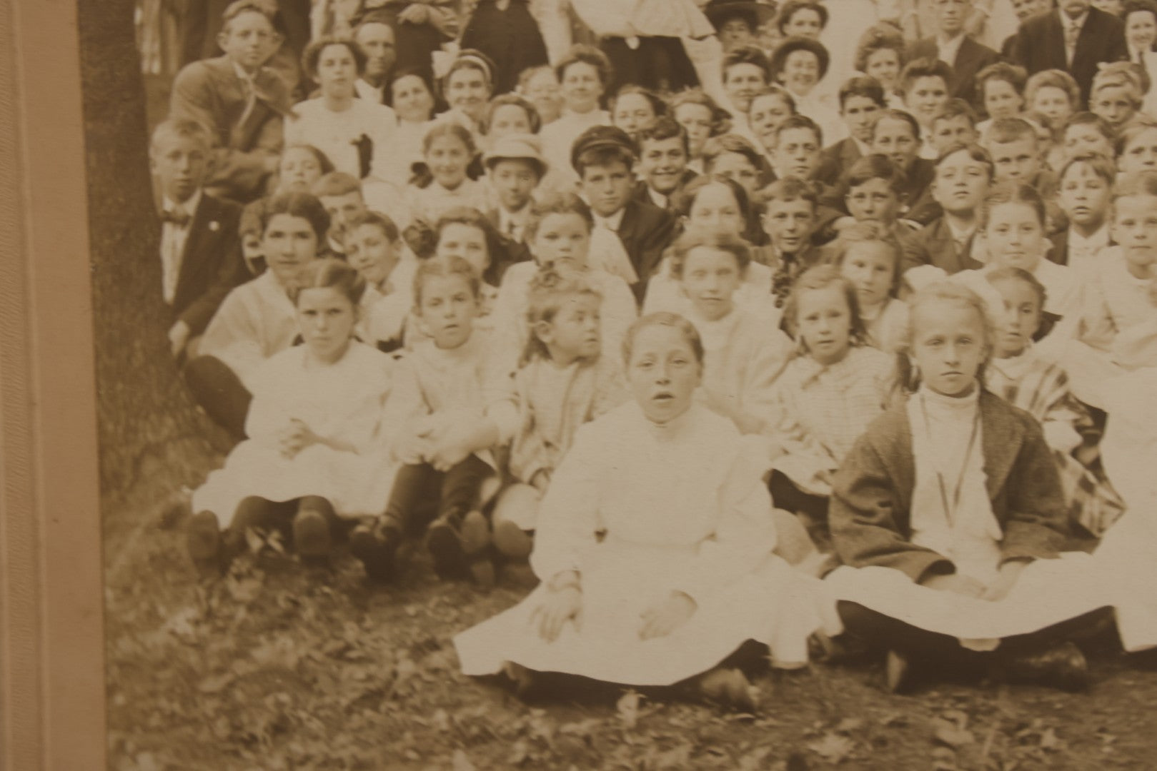 Lot 137 - Antique Boarded Photograph Of Large Group Of Children In Woodland Clearing With Adults Standing Behind, Likely Summer Camp, Photographed By Moon Co. Photo, Worcester, Massachusetts, June 28, 1910