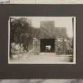 Lot 141 - Antique Boarded Photograph Of Garage With Early Automobile, Kendall's Spavin And Flint's Powder Signage, Three People With Wagon