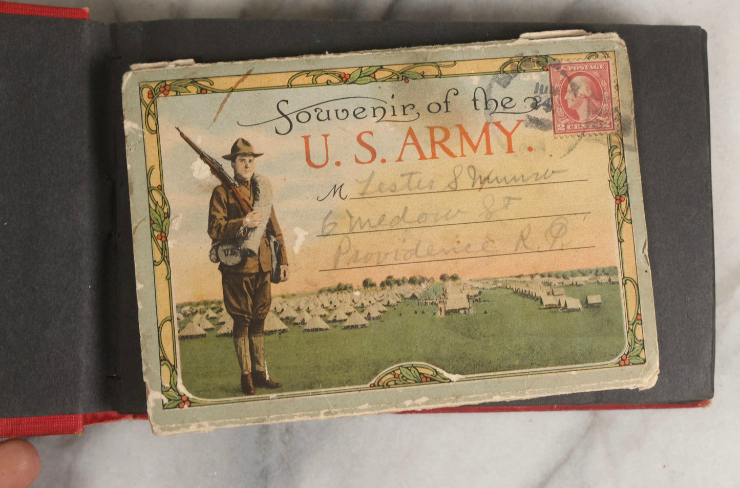 Lot 143 - Antique Postcard Album Containing 50 Postcards Including Numerous Real Photo Postcards R.P.P.C.S With World War One Soldiers, Sailor, Other Portraits, And U.S. Army Souvenir Postcard Folder