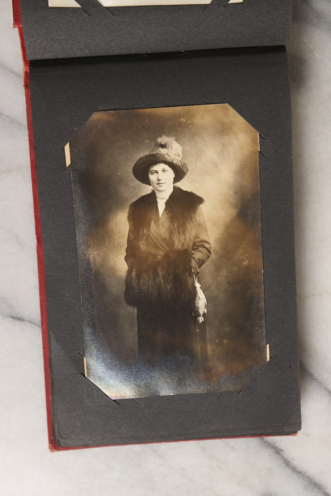 Lot 143 - Antique Postcard Album Containing 50 Postcards Including Numerous Real Photo Postcards R.P.P.C.S With World War One Soldiers, Sailor, Other Portraits, And U.S. Army Souvenir Postcard Folder