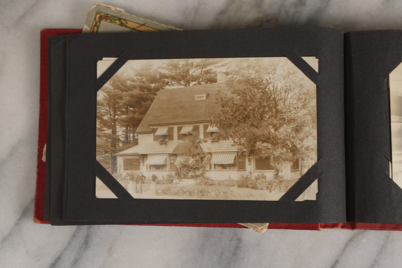 Lot 143 - Antique Postcard Album Containing 50 Postcards Including Numerous Real Photo Postcards R.P.P.C.S With World War One Soldiers, Sailor, Other Portraits, And U.S. Army Souvenir Postcard Folder