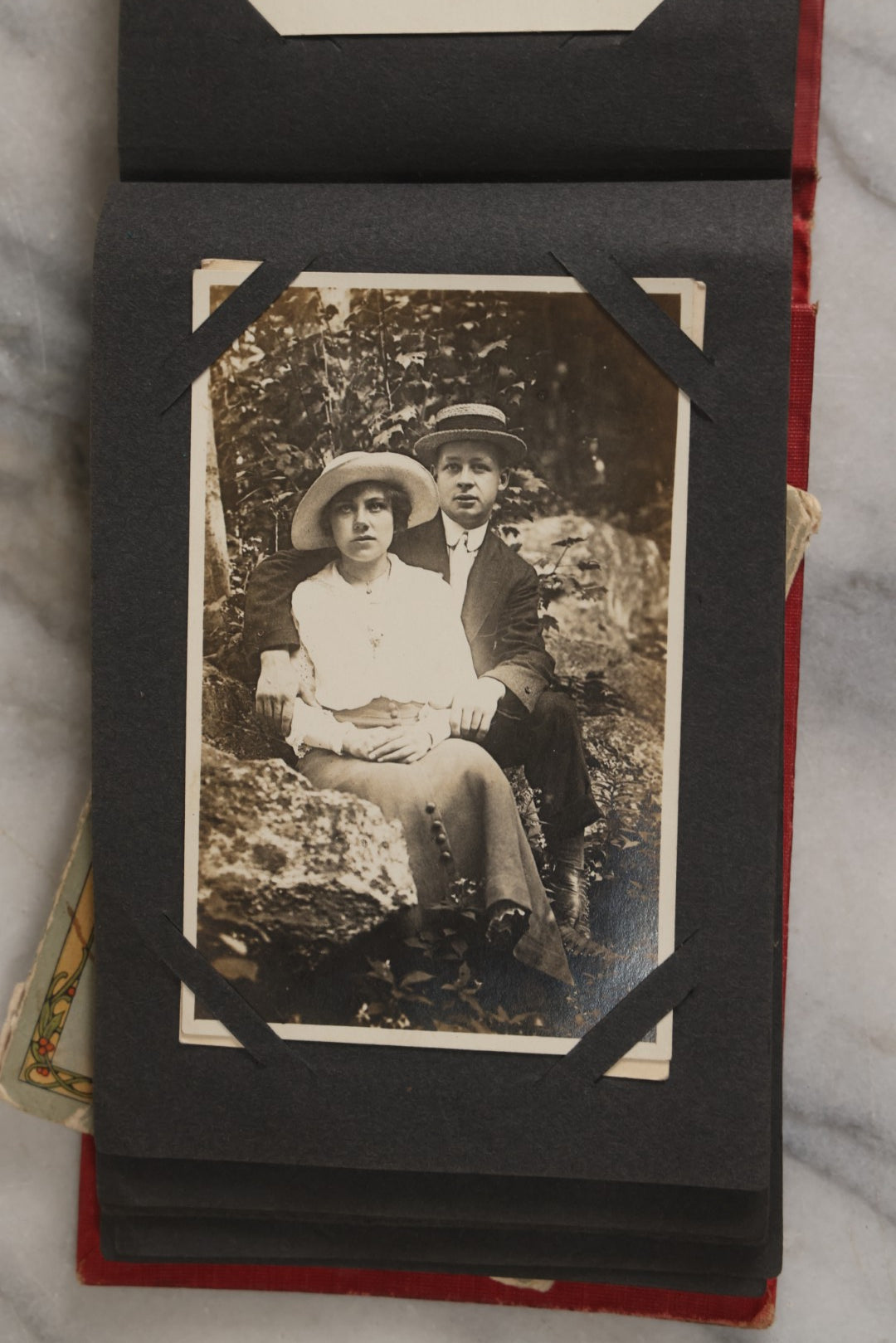 Lot 143 - Antique Postcard Album Containing 50 Postcards Including Numerous Real Photo Postcards R.P.P.C.S With World War One Soldiers, Sailor, Other Portraits, And U.S. Army Souvenir Postcard Folder