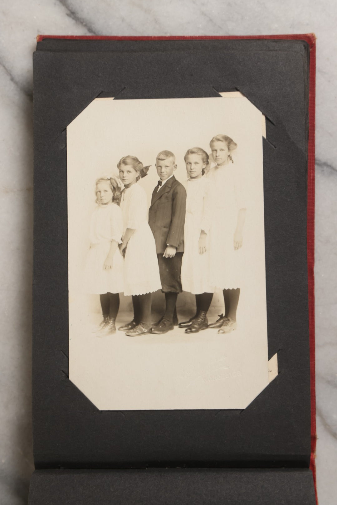 Lot 143 - Antique Postcard Album Containing 50 Postcards Including Numerous Real Photo Postcards R.P.P.C.S With World War One Soldiers, Sailor, Other Portraits, And U.S. Army Souvenir Postcard Folder