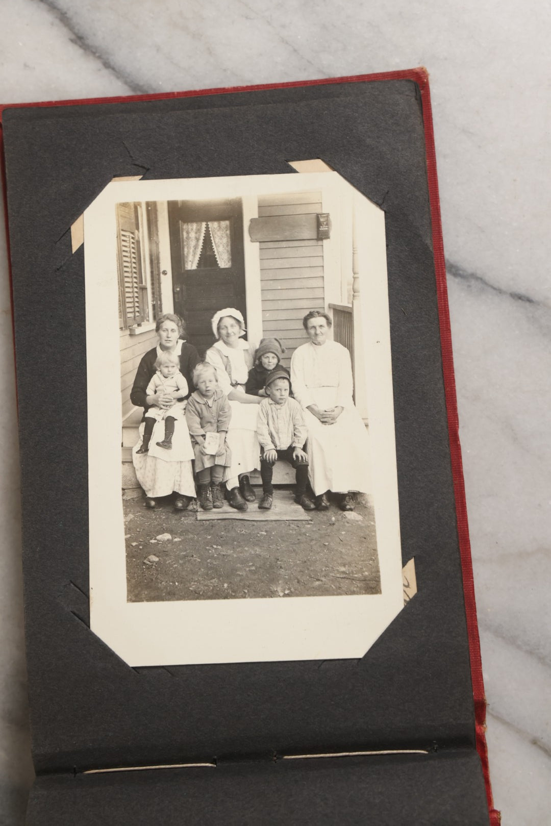 Lot 143 - Antique Postcard Album Containing 50 Postcards Including Numerous Real Photo Postcards R.P.P.C.S With World War One Soldiers, Sailor, Other Portraits, And U.S. Army Souvenir Postcard Folder