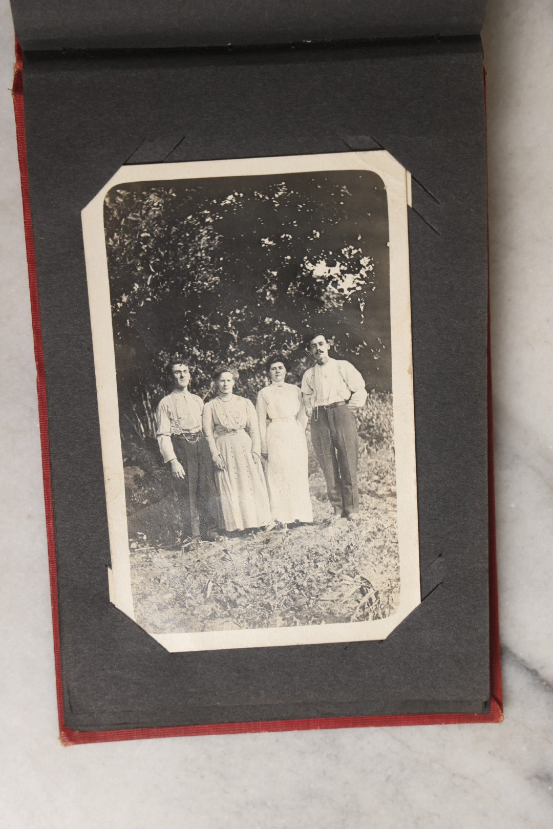 Lot 143 - Antique Postcard Album Containing 50 Postcards Including Numerous Real Photo Postcards R.P.P.C.S With World War One Soldiers, Sailor, Other Portraits, And U.S. Army Souvenir Postcard Folder