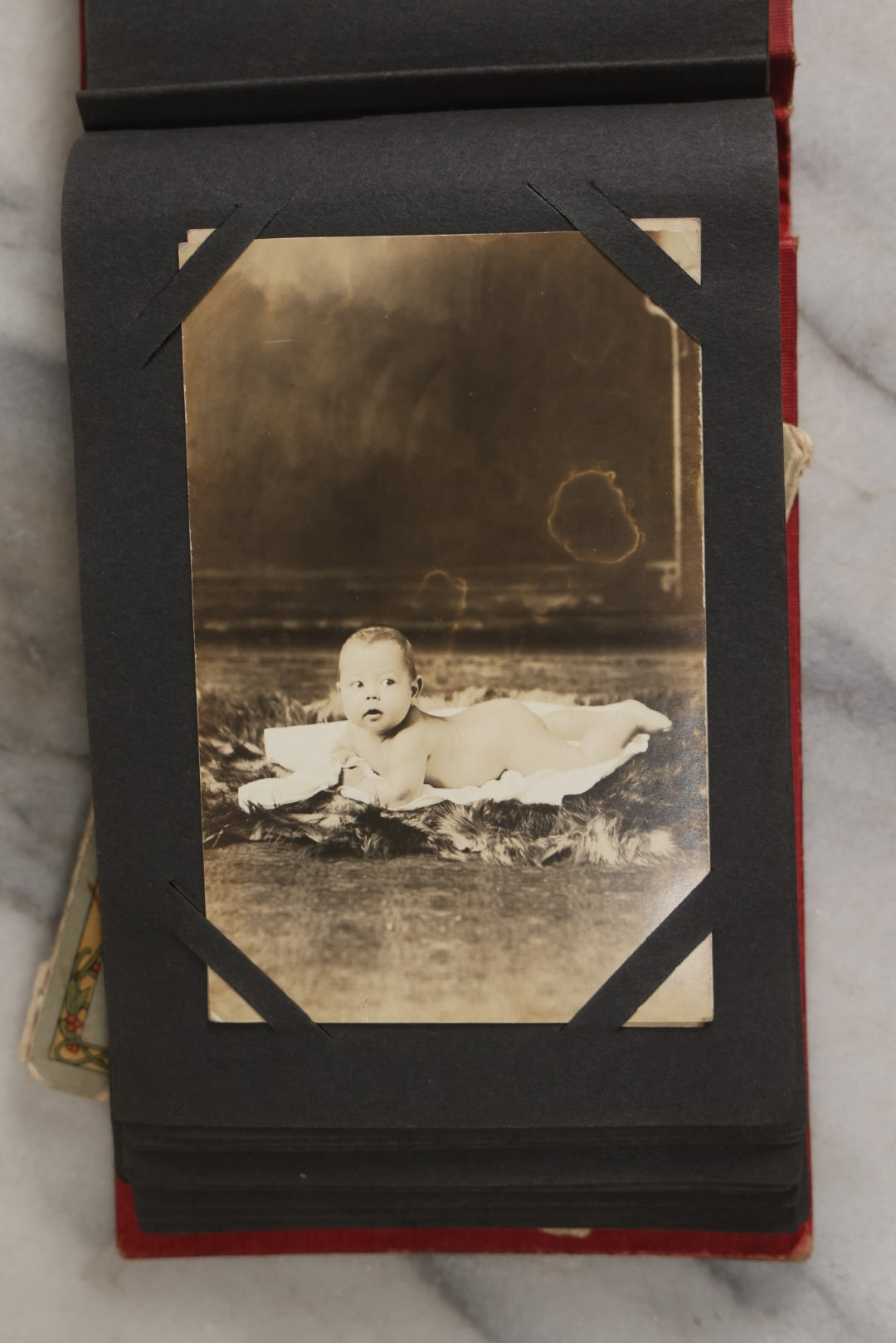 Lot 143 - Antique Postcard Album Containing 50 Postcards Including Numerous Real Photo Postcards R.P.P.C.S With World War One Soldiers, Sailor, Other Portraits, And U.S. Army Souvenir Postcard Folder