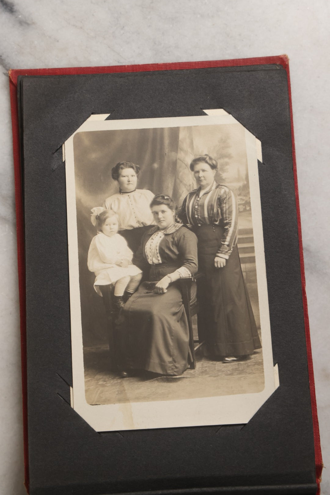 Lot 143 - Antique Postcard Album Containing 50 Postcards Including Numerous Real Photo Postcards R.P.P.C.S With World War One Soldiers, Sailor, Other Portraits, And U.S. Army Souvenir Postcard Folder