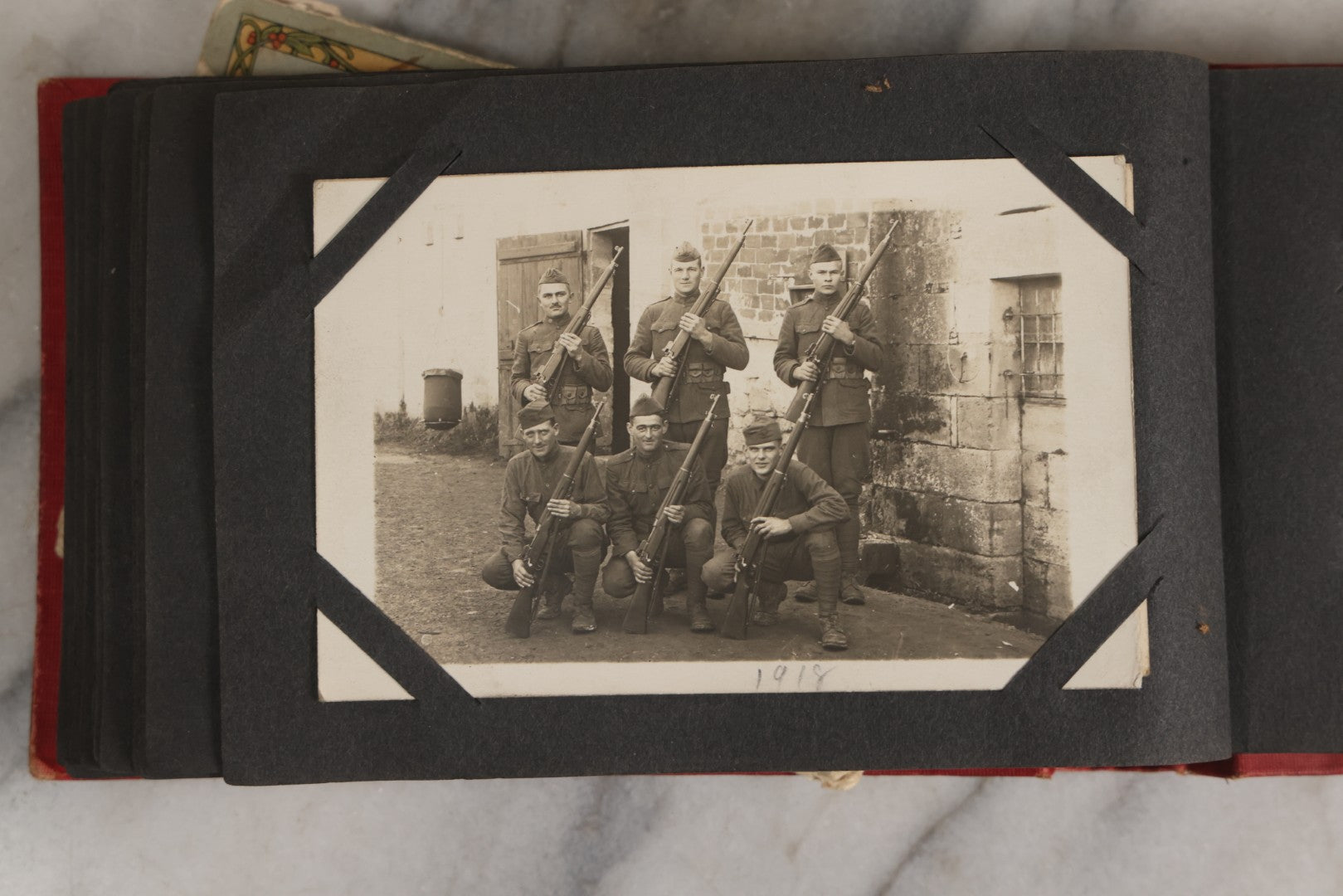 Lot 143 - Antique Postcard Album Containing 50 Postcards Including Numerous Real Photo Postcards R.P.P.C.S With World War One Soldiers, Sailor, Other Portraits, And U.S. Army Souvenir Postcard Folder