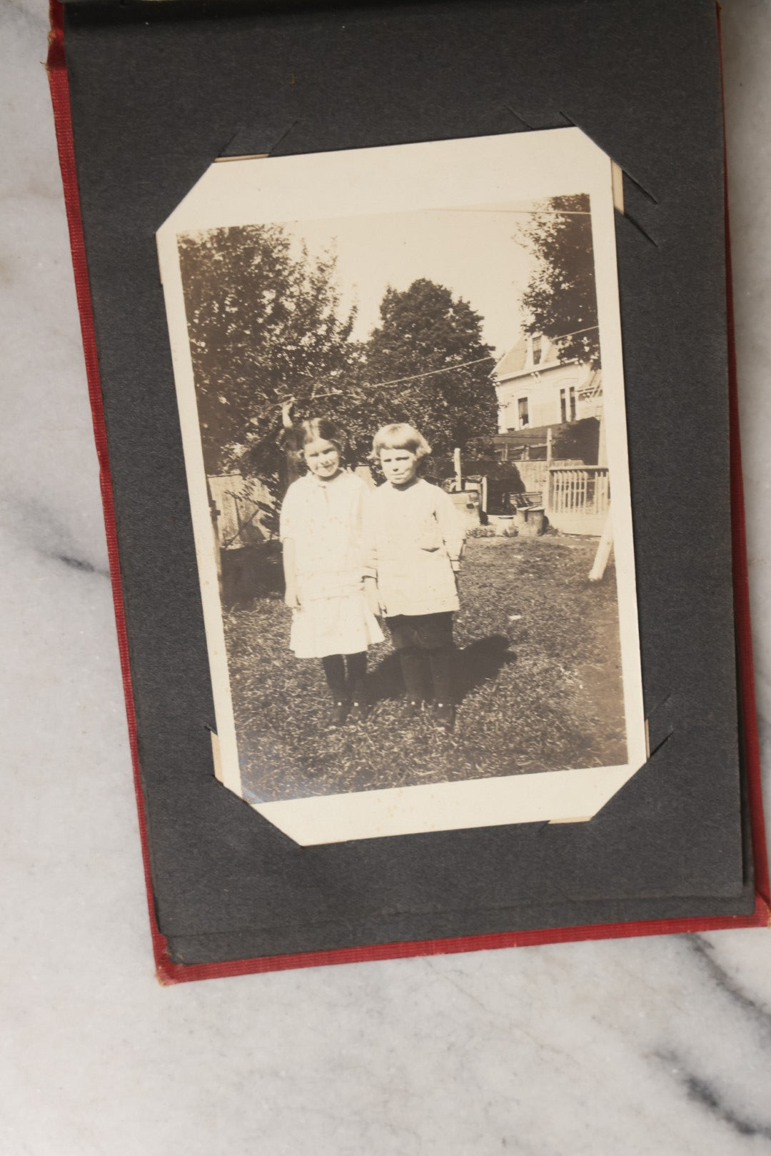 Lot 143 - Antique Postcard Album Containing 50 Postcards Including Numerous Real Photo Postcards R.P.P.C.S With World War One Soldiers, Sailor, Other Portraits, And U.S. Army Souvenir Postcard Folder