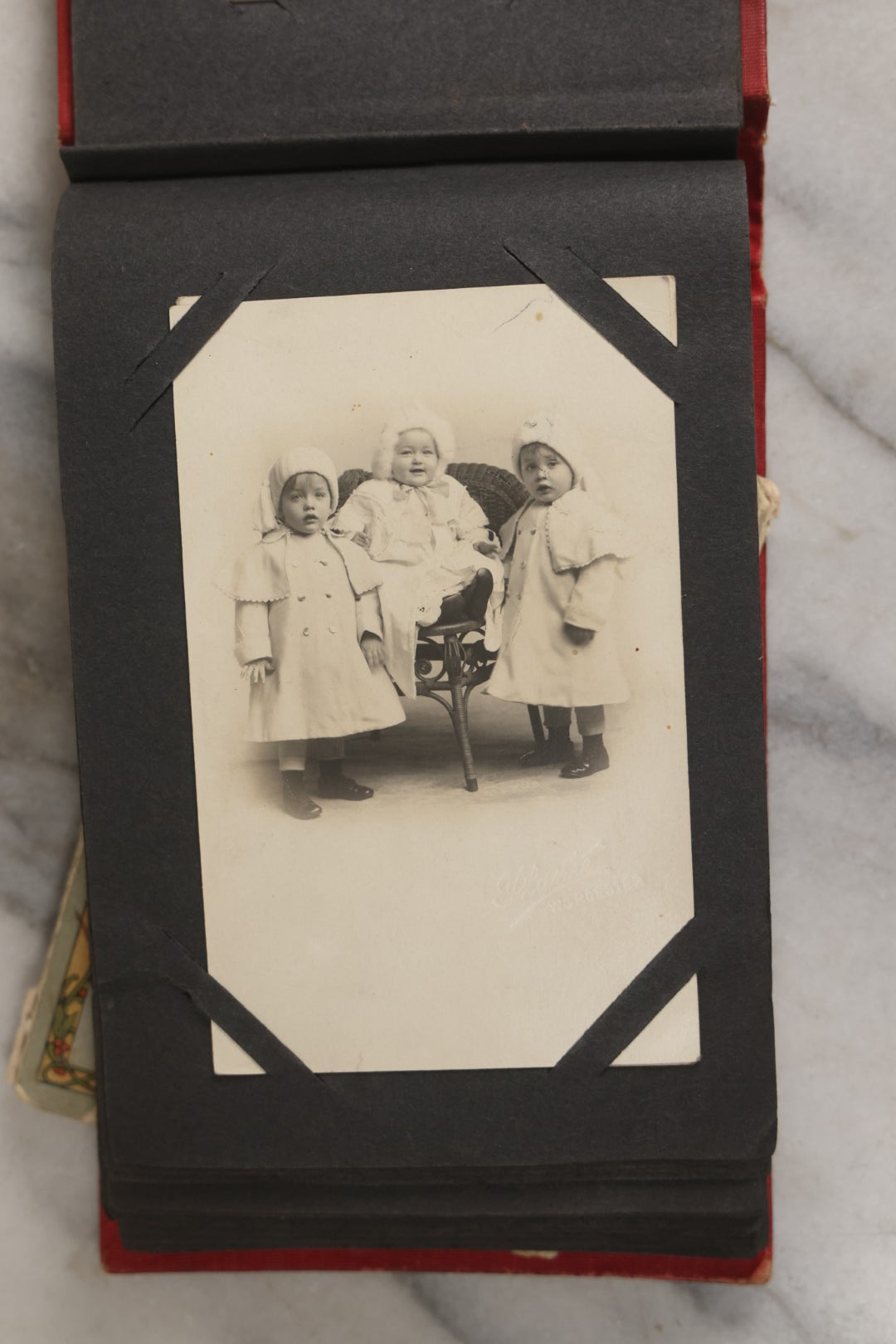 Lot 143 - Antique Postcard Album Containing 50 Postcards Including Numerous Real Photo Postcards R.P.P.C.S With World War One Soldiers, Sailor, Other Portraits, And U.S. Army Souvenir Postcard Folder