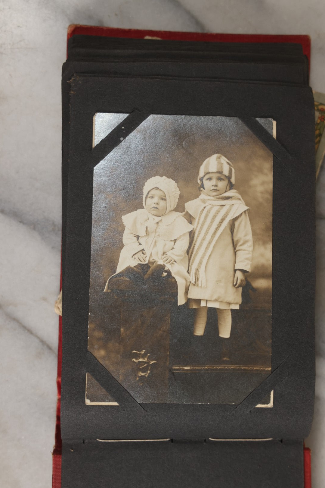 Lot 143 - Antique Postcard Album Containing 50 Postcards Including Numerous Real Photo Postcards R.P.P.C.S With World War One Soldiers, Sailor, Other Portraits, And U.S. Army Souvenir Postcard Folder