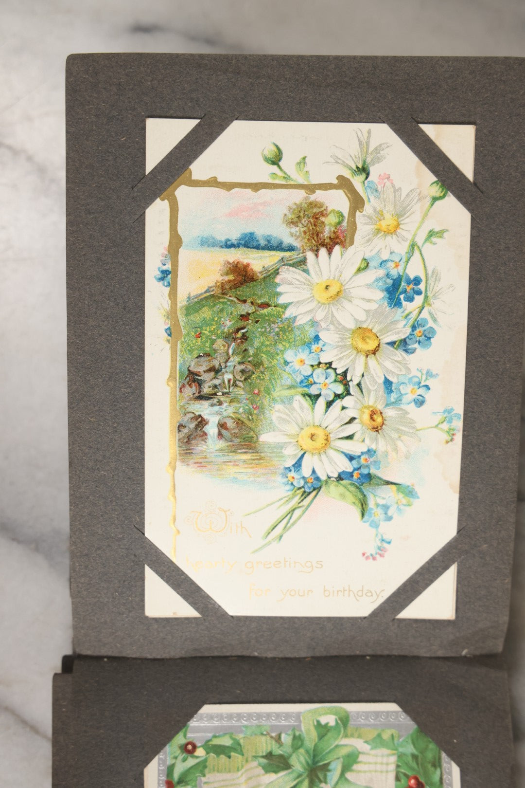 Lot 144 - Antique Postcard Album Containing 33 Postcards Including Christmas, Valentine's, & Easter Cards And Massachusetts Views Such As Charlestown Bridge, Haunted Mill In West Peabody, Deer Island Light, Narbonne House, And Malden Fire House No. 1