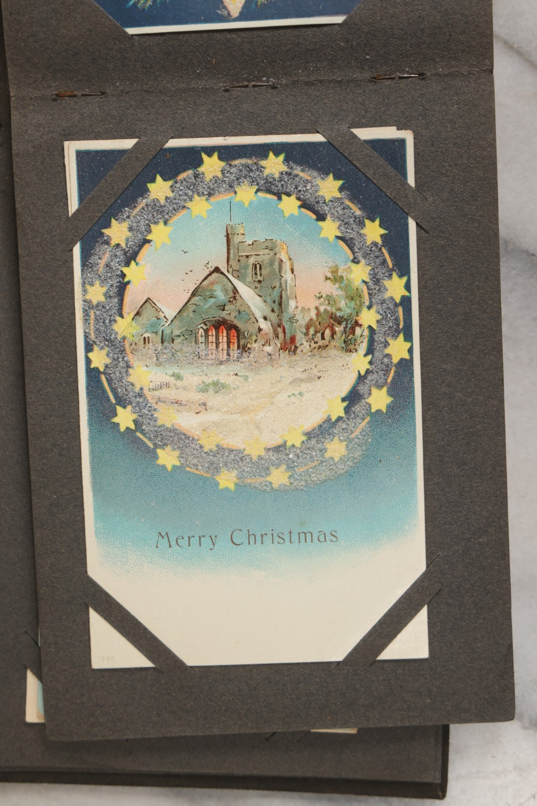 Lot 144 - Antique Postcard Album Containing 33 Postcards Including Christmas, Valentine's, & Easter Cards And Massachusetts Views Such As Charlestown Bridge, Haunted Mill In West Peabody, Deer Island Light, Narbonne House, And Malden Fire House No. 1