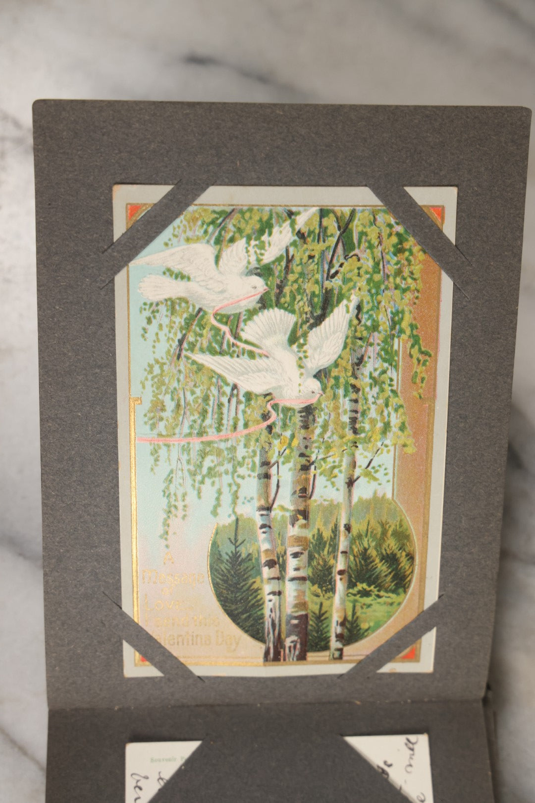 Lot 144 - Antique Postcard Album Containing 33 Postcards Including Christmas, Valentine's, & Easter Cards And Massachusetts Views Such As Charlestown Bridge, Haunted Mill In West Peabody, Deer Island Light, Narbonne House, And Malden Fire House No. 1