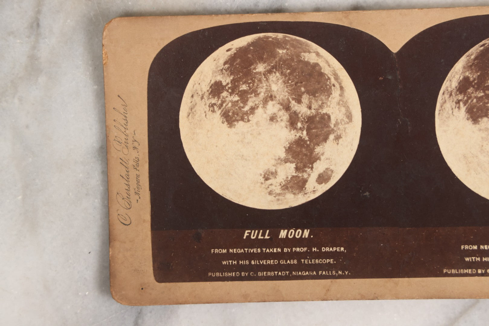 Lot 145 - Antique Photographic Stereoview Of The Full Moon From Negatives Taken By Prof. H. Draper With His Silvered Glass Telescope, Published By C. Bierstadt, Niagara Falls, New York, And Sold By Underwood And Underwood