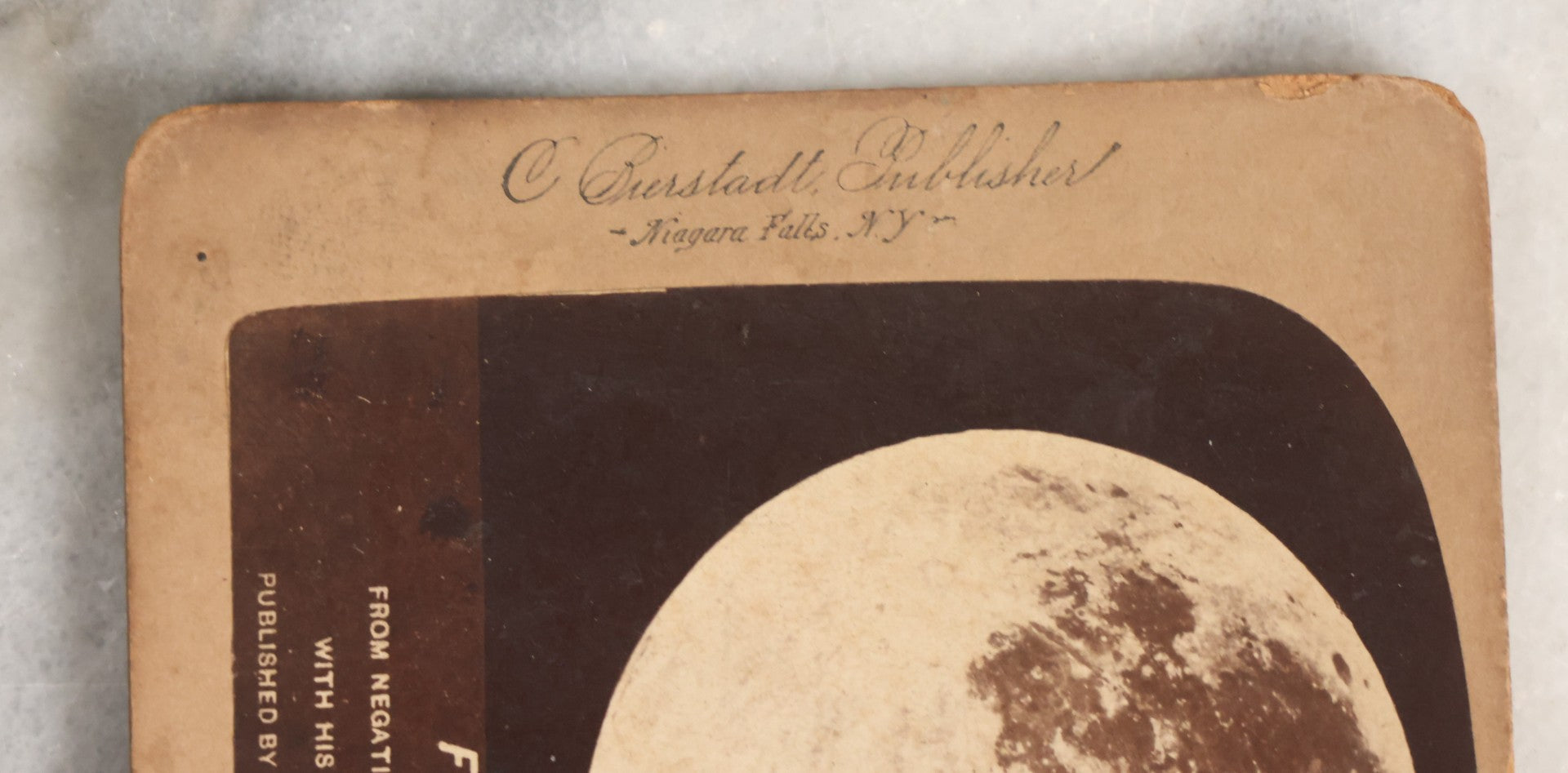 Lot 145 - Antique Photographic Stereoview Of The Full Moon From Negatives Taken By Prof. H. Draper With His Silvered Glass Telescope, Published By C. Bierstadt, Niagara Falls, New York, And Sold By Underwood And Underwood