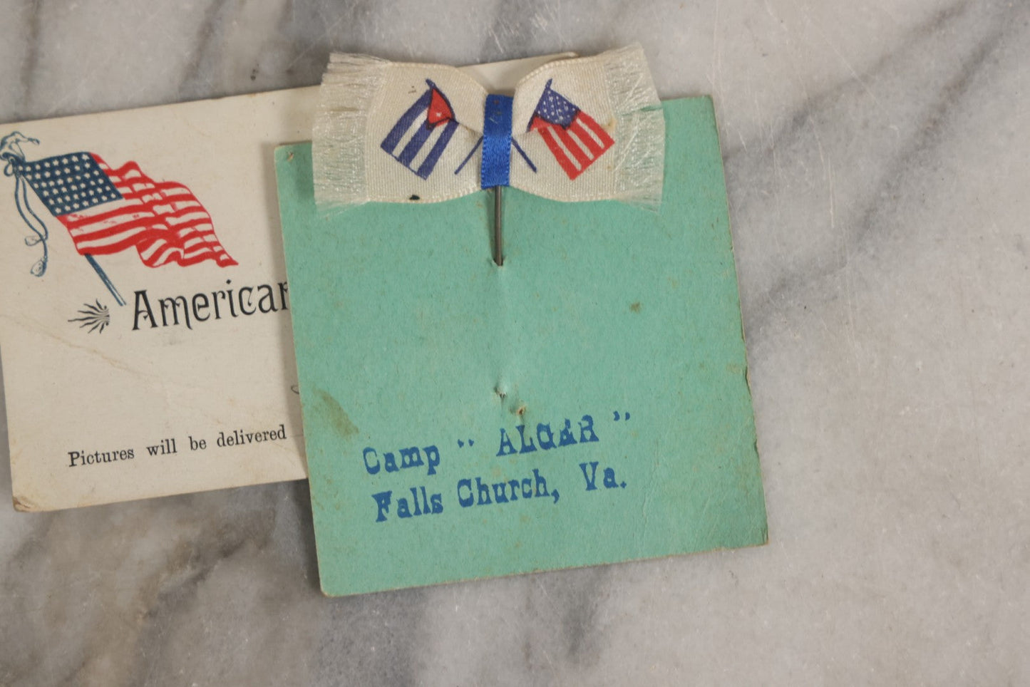 Lot 151 - Antique Box Lot Of Fifteen “Pocket Kodak” Miniature Boarded Photographs Including Dog On Stool, Boys Smoking Pipes, And Man In Workshop, With Camp Alger Flag Pin And American Views Co. Trade Card In John D. Cutter & Co. Chromolithograph Box