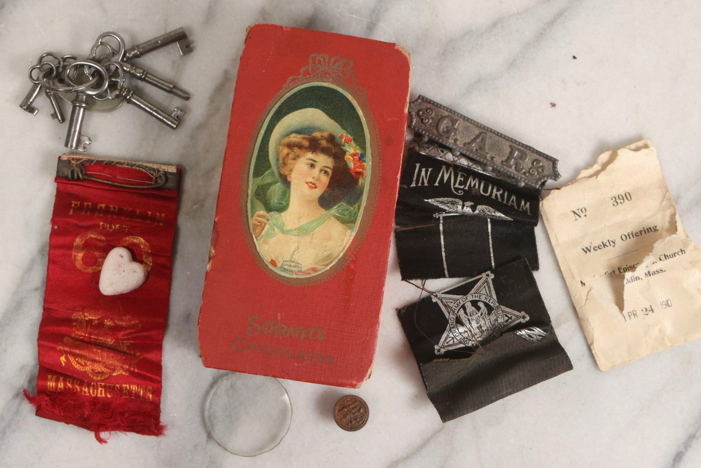Lot 154 - Antique Box Lot In Red Schrafft's Chocolate Box With 1908 Cameo Lid Containing G.A.R. Post 60 Ribbons, Keys Of Henry G. Trask Of Yarmouth, N.S., And Grand Army Of The Republic Veteran Button