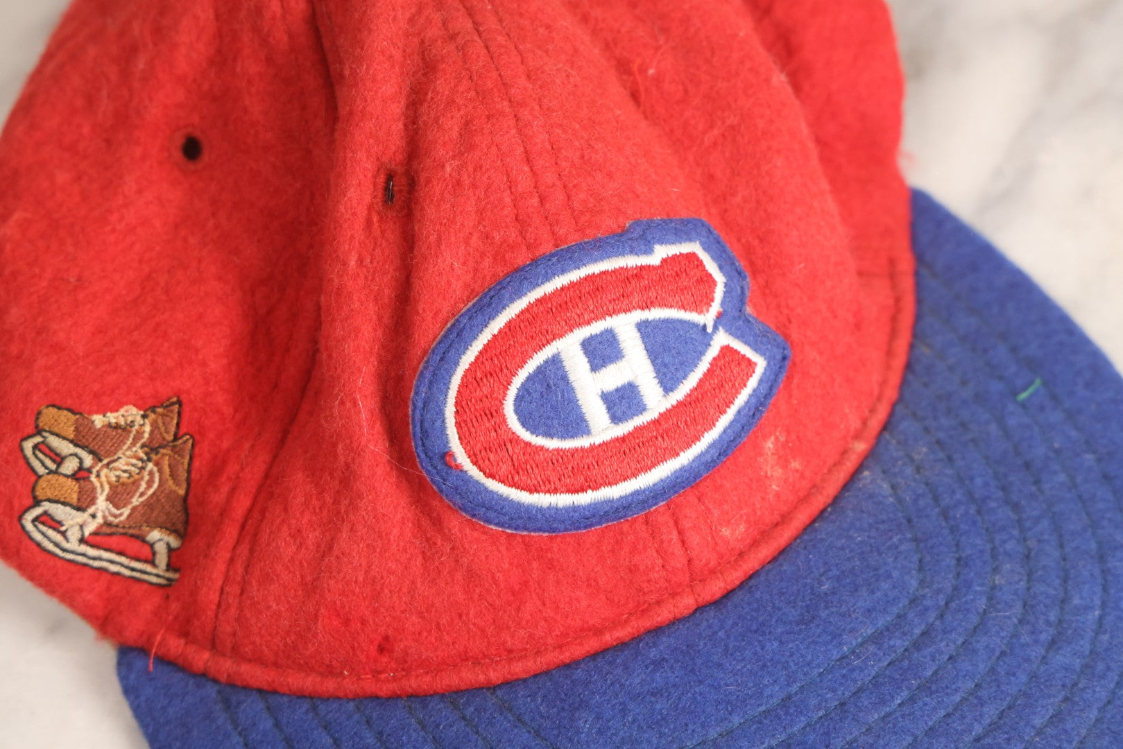 Lot 173 - Vintage Montreal Canadiens N.H.L. Wool Felt Hat With Embroidered Ice Skate Graphic, Blue Bill With Red Body, Made In U.S.A..