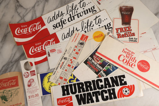 Lot 174 - Grouping Of 14 Vintage Coca-Cola Advertising Items Including Paper Hat, Bottle Protector, Portland Beavers And Winter Hawks Memorabilia, Super Bowl XIII Scratch Tickets, And More