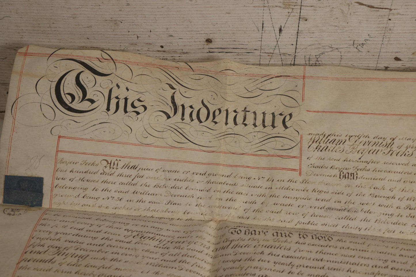 Lot 175 - Antique 1843 Property Indenture Document With Ornate Calligraphy, Red Pinstriping, And Revenue Stamps, Note Holes And Wear To Folded Edges And Corners