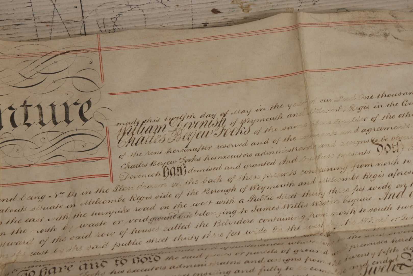 Lot 175 - Antique 1843 Property Indenture Document With Ornate Calligraphy, Red Pinstriping, And Revenue Stamps, Note Holes And Wear To Folded Edges And Corners