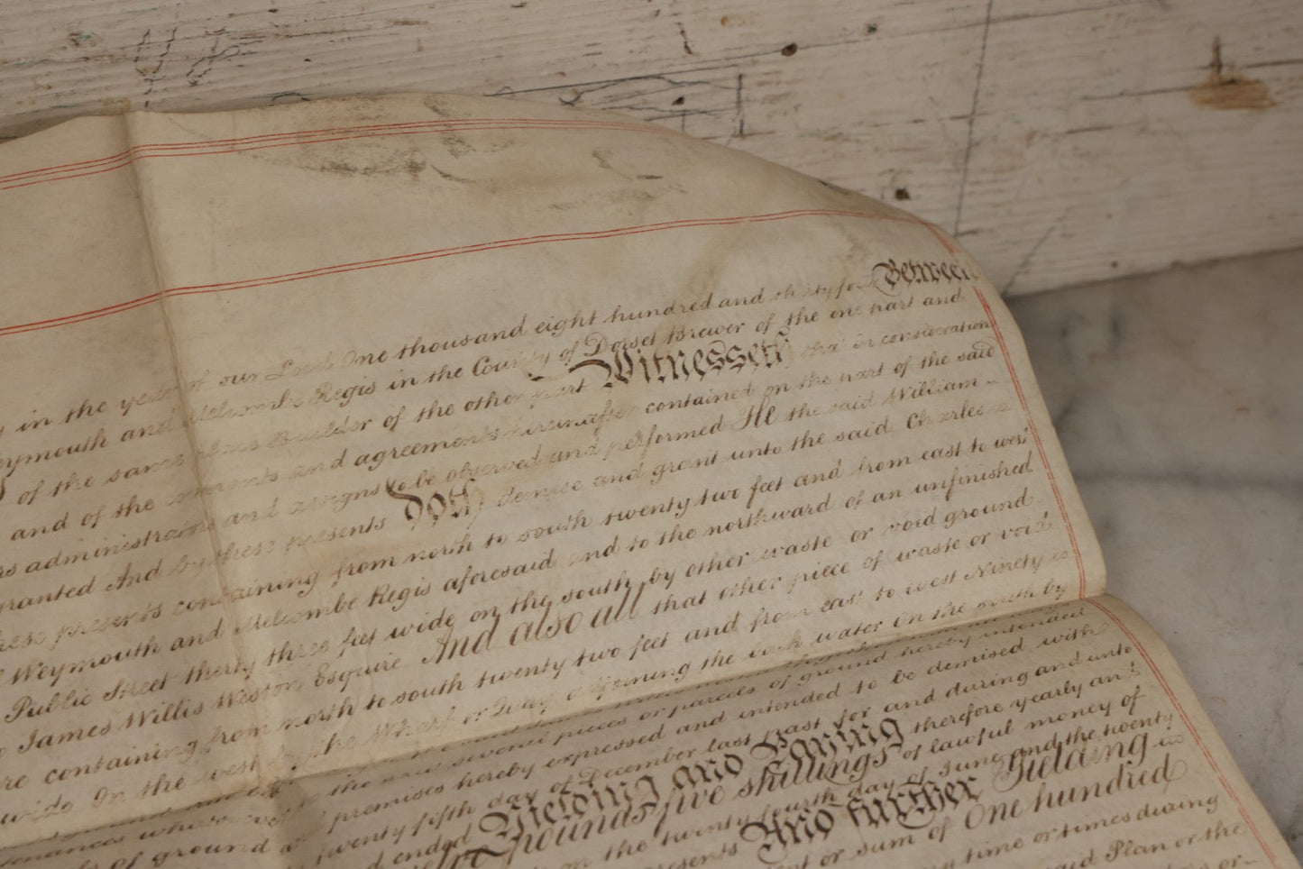 Lot 175 - Antique 1843 Property Indenture Document With Ornate Calligraphy, Red Pinstriping, And Revenue Stamps, Note Holes And Wear To Folded Edges And Corners