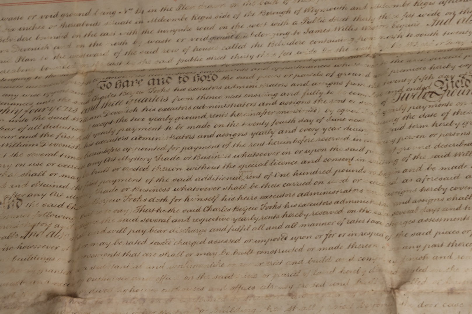 Lot 175 - Antique 1843 Property Indenture Document With Ornate Calligraphy, Red Pinstriping, And Revenue Stamps, Note Holes And Wear To Folded Edges And Corners