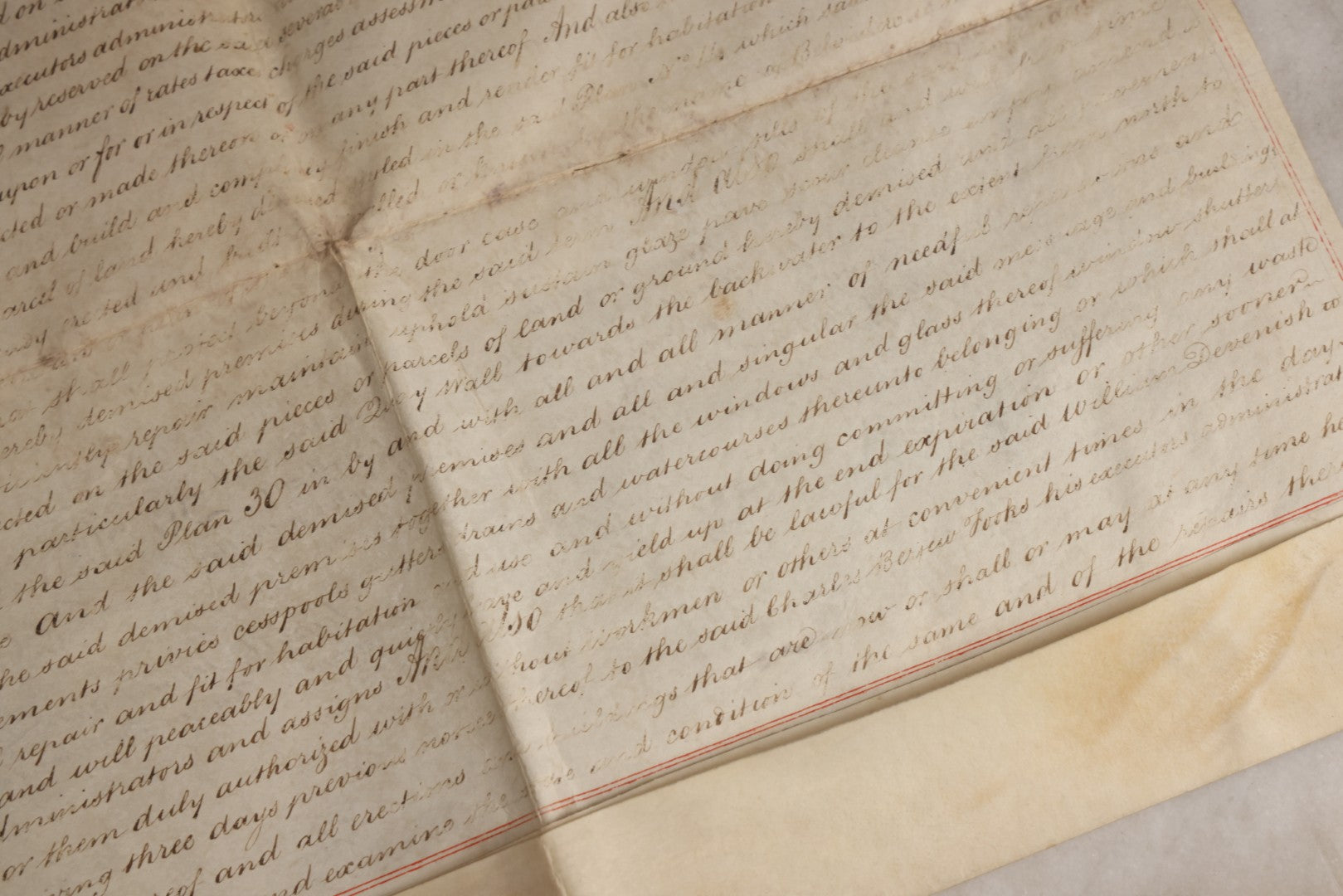 Lot 175 - Antique 1843 Property Indenture Document With Ornate Calligraphy, Red Pinstriping, And Revenue Stamps, Note Holes And Wear To Folded Edges And Corners