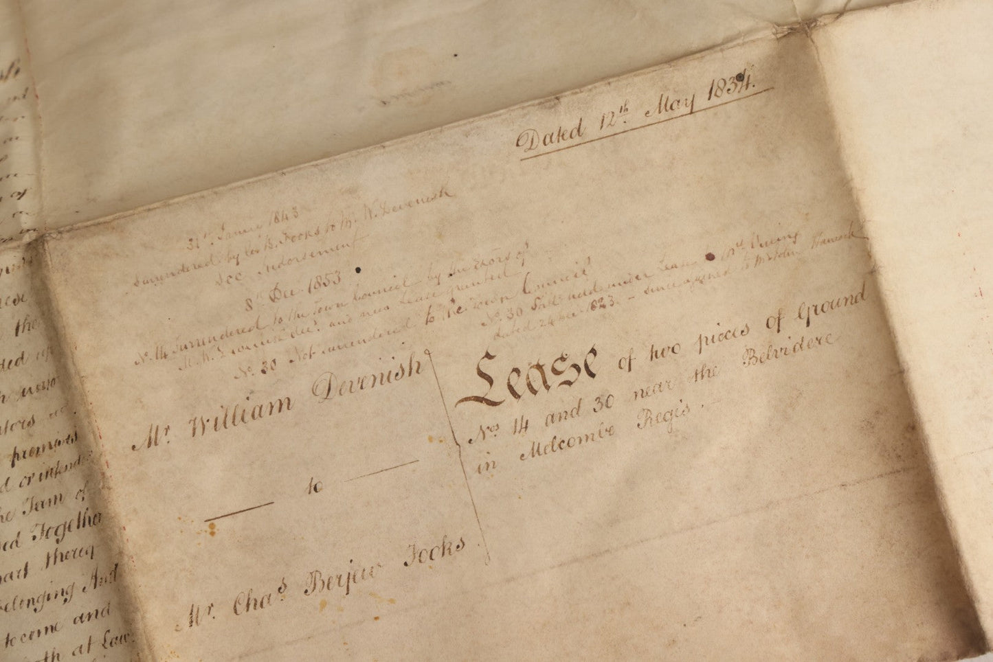 Lot 175 - Antique 1843 Property Indenture Document With Ornate Calligraphy, Red Pinstriping, And Revenue Stamps, Note Holes And Wear To Folded Edges And Corners