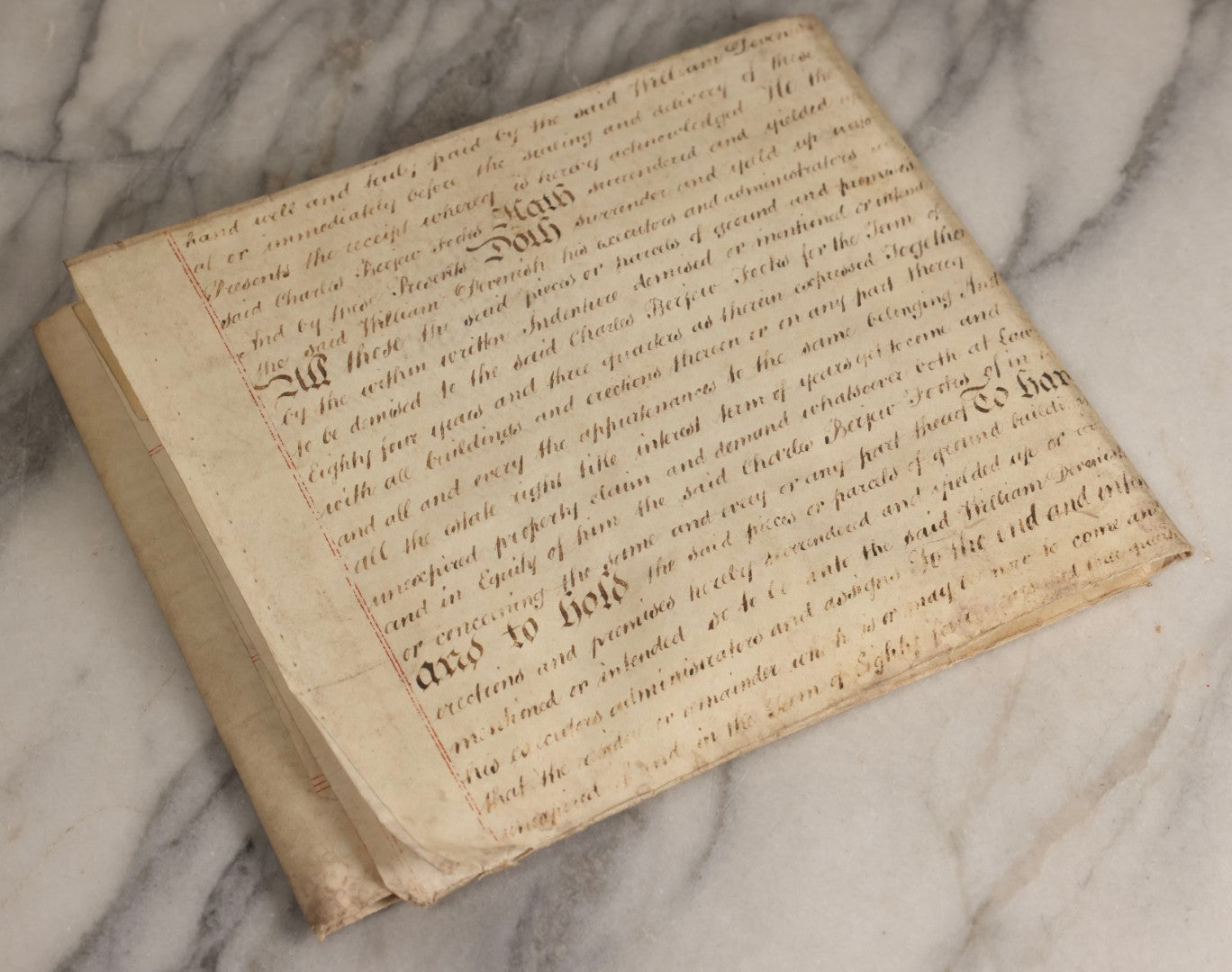 Lot 175 - Antique 1843 Property Indenture Document With Ornate Calligraphy, Red Pinstriping, And Revenue Stamps, Note Holes And Wear To Folded Edges And Corners