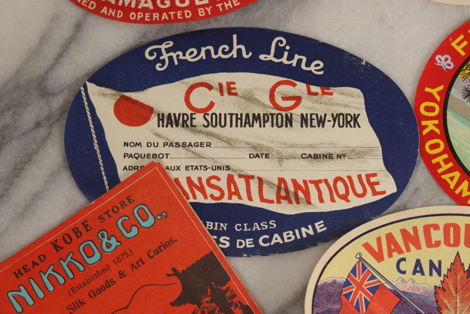 Lot 179 - Grouping Of 12 Vintage Travel Decals Including Fujimatsu Hotel Yokohama Japan, Hotel Camaguey Cuba, Grand Coulee Dam Washington, Death Valley 49ers Member