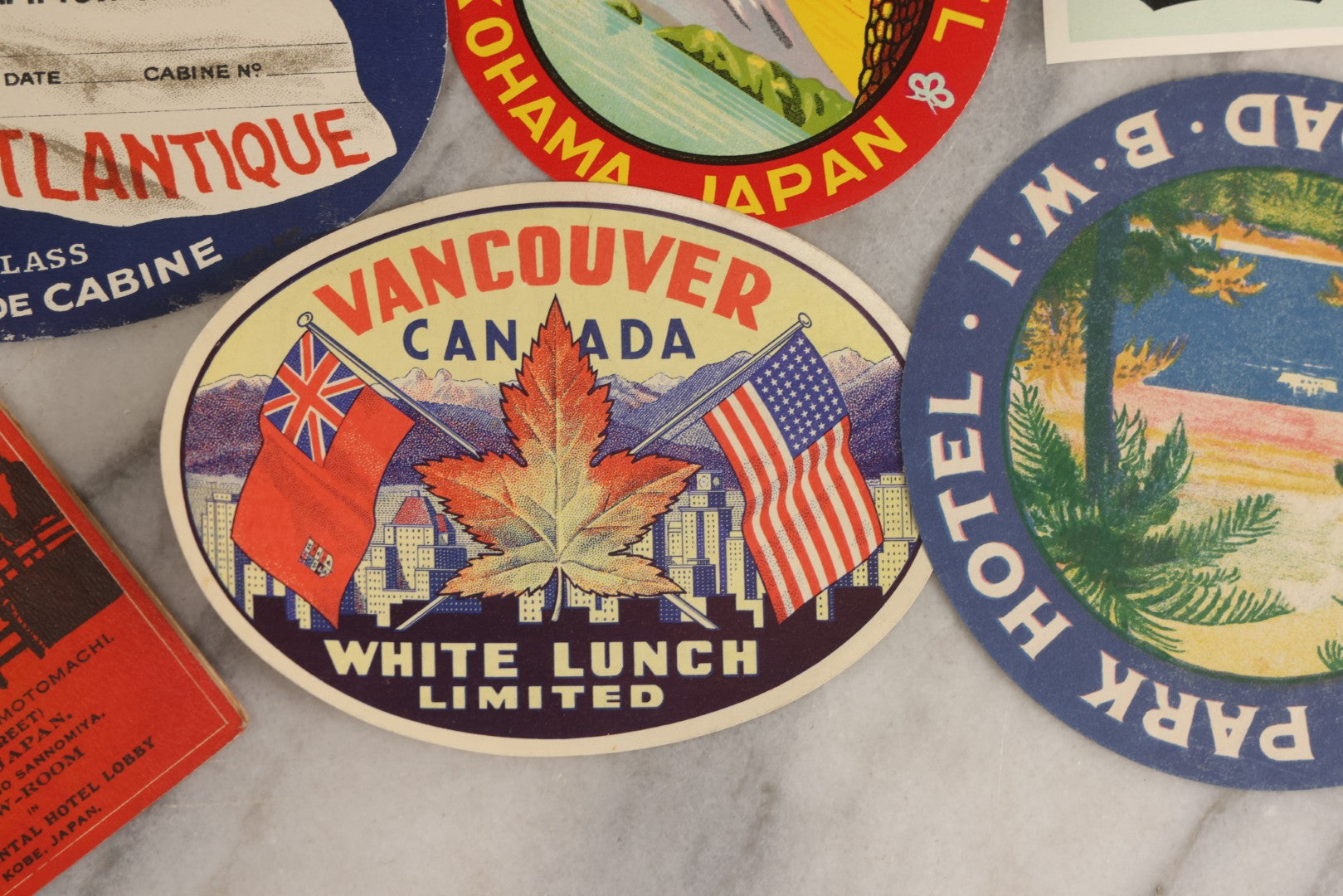 Lot 179 - Grouping Of 12 Vintage Travel Decals Including Fujimatsu Hotel Yokohama Japan, Hotel Camaguey Cuba, Grand Coulee Dam Washington, Death Valley 49ers Member