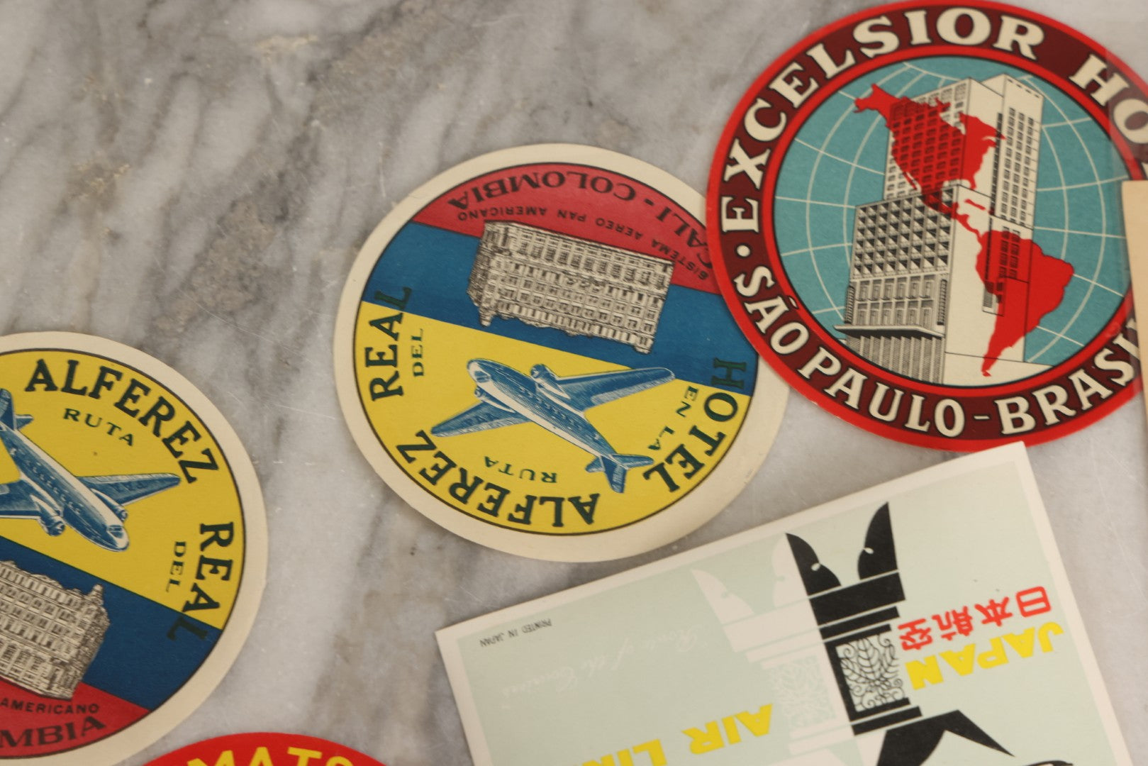 Lot 179 - Grouping Of 12 Vintage Travel Decals Including Fujimatsu Hotel Yokohama Japan, Hotel Camaguey Cuba, Grand Coulee Dam Washington, Death Valley 49ers Member