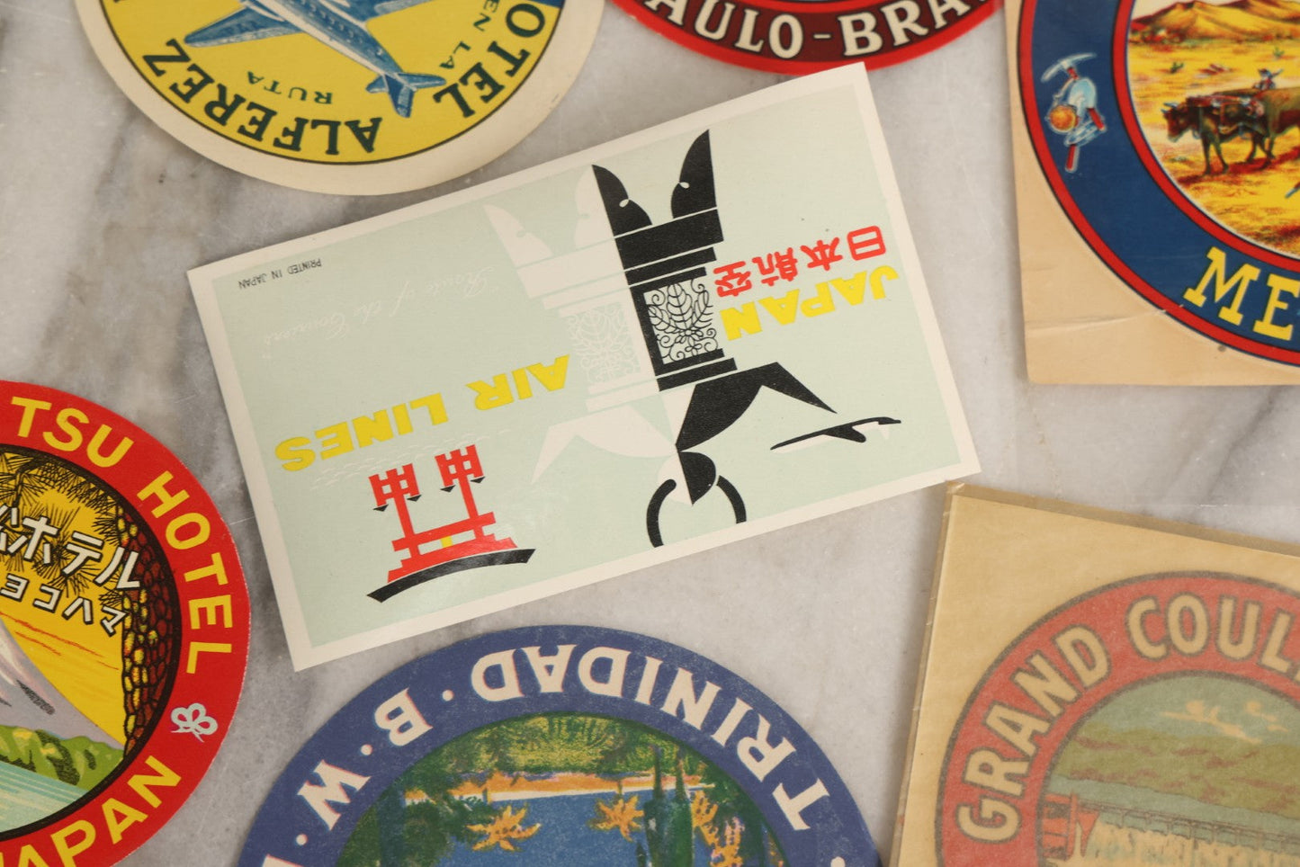Lot 179 - Grouping Of 12 Vintage Travel Decals Including Fujimatsu Hotel Yokohama Japan, Hotel Camaguey Cuba, Grand Coulee Dam Washington, Death Valley 49ers Member