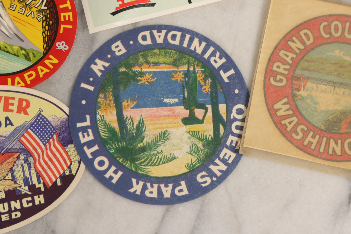 Lot 179 - Grouping Of 12 Vintage Travel Decals Including Fujimatsu Hotel Yokohama Japan, Hotel Camaguey Cuba, Grand Coulee Dam Washington, Death Valley 49ers Member