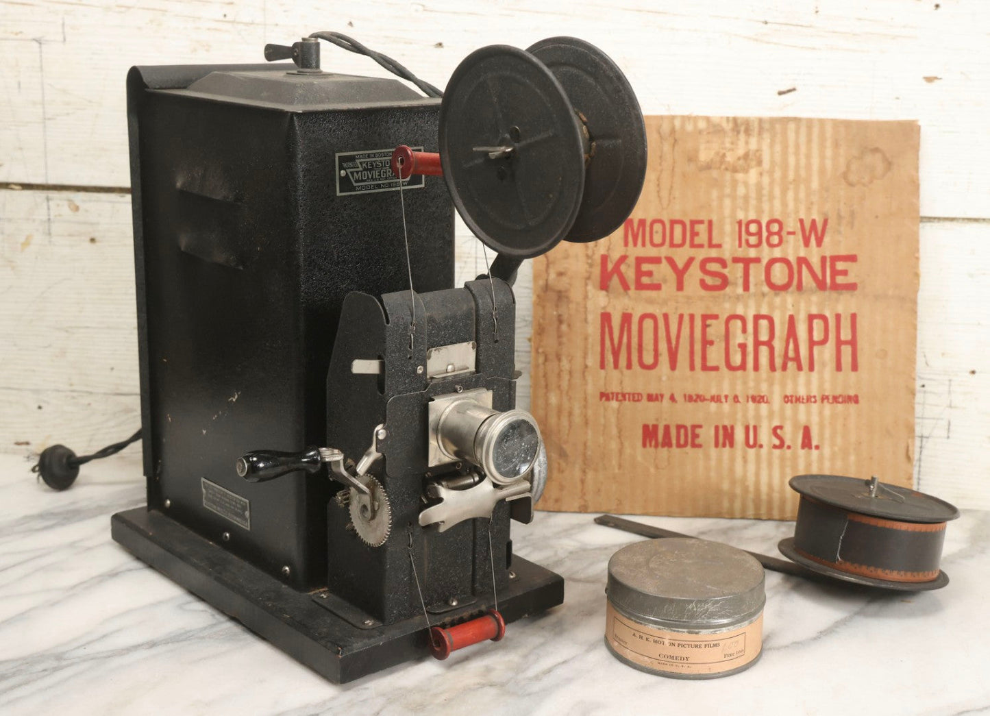 Lot 001 - Antique Keystone Moviegraph Hand-Crank 35Mm Motion Picture Film Toy Projector, Model 198-W, Patented 1920, With Period Comedy Film And Portion Of Original Box