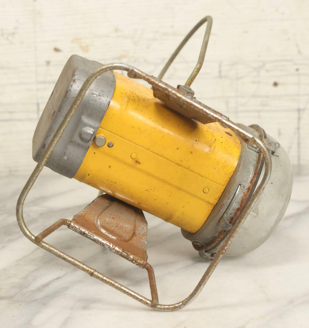 Lot 010 - Vintage Justrite No. 2198 Battery Powered Flashlight With Yellow Metal Body, Justrite Manufacturing Co., Chicago, Illinois, 11" H