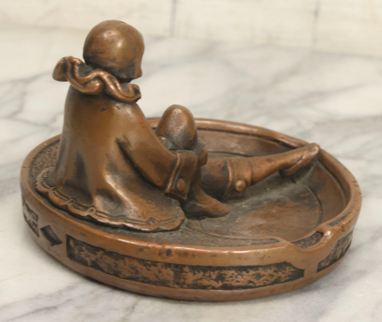 Lot 017 - Antique Art Deco Pierrot Clown Chalkware Ashtray With Bronzed Metal Shell And Figural Female Form, 6-1/8" Diameter