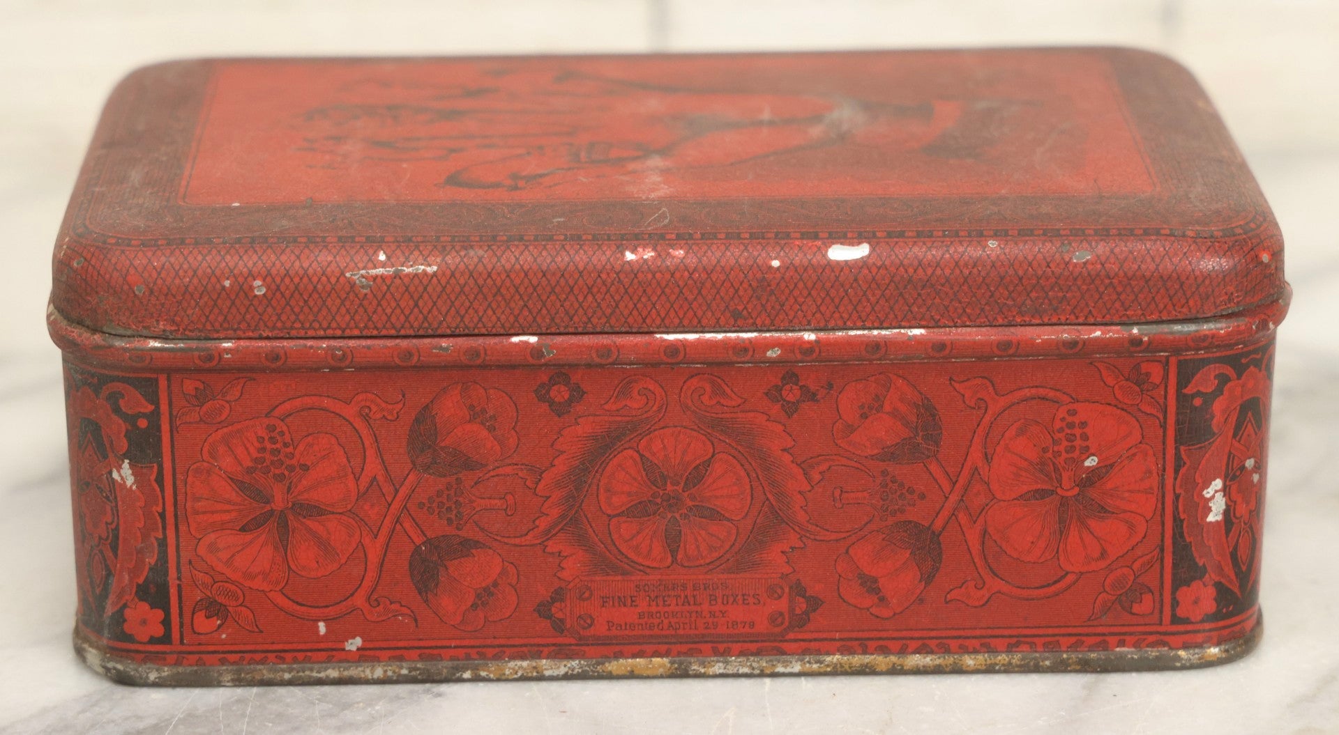 Lot 019 - Antique Red Metal Storage Box With Anthropomorphic Pig Hand Graphic, Somers Bros. Fine Metal Boxes, Brooklyn, New York, Patented April 29, 1879