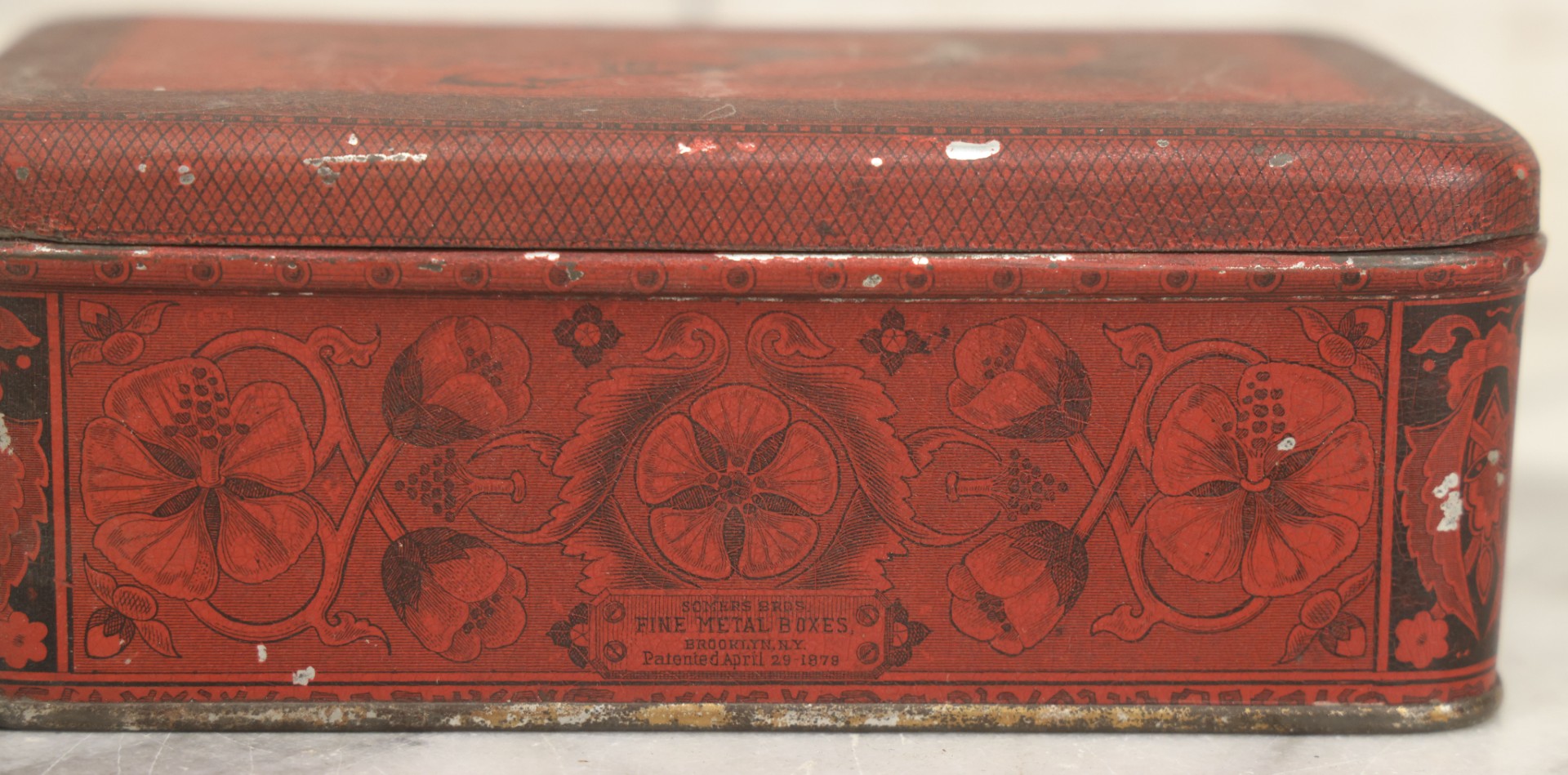 Lot 019 - Antique Red Metal Storage Box With Anthropomorphic Pig Hand Graphic, Somers Bros. Fine Metal Boxes, Brooklyn, New York, Patented April 29, 1879