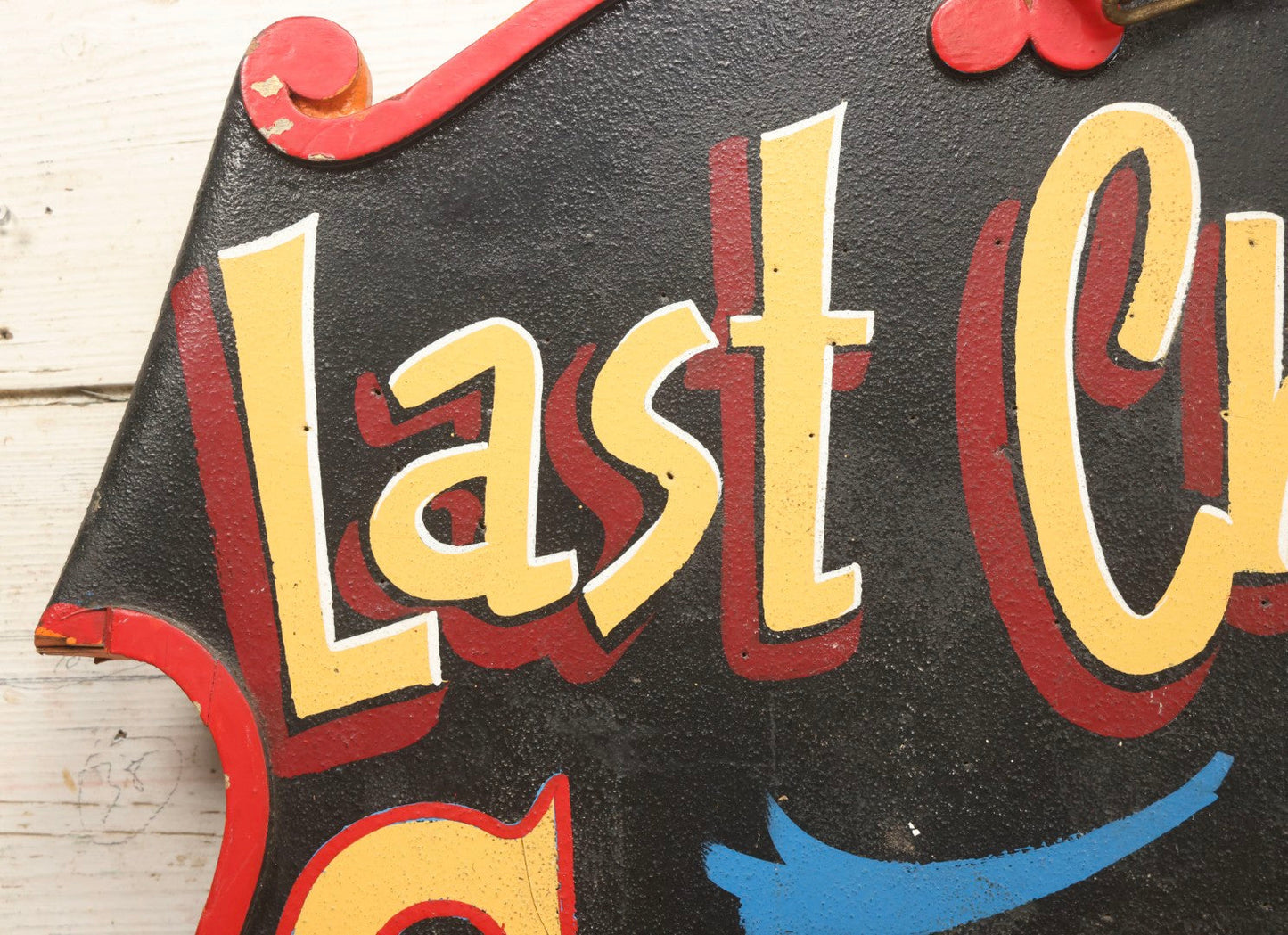 Lot 034 - Double-Sided Wooden Shield-Form Sign With Raised Letters “Burdett 18 College” And Modern Repurposed Side Painted “Last Chance Saloon," Note Missing Corner Scroll Piece And Large Crack In Other Scroll Corner, 25-1/2" x 26"